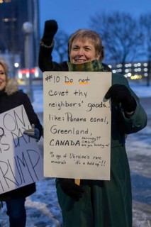 Detroit, Michigan USA - 17 February 2025 - People say 'No Kings on Presidents Day' in response to
