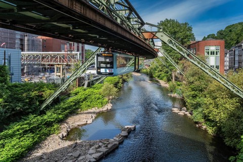The Wuppertal suspension railway runs through a historic district and industrial area near the