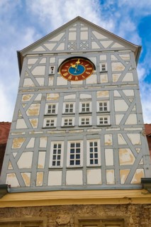 Spitalhof, medieval hospital, historic building on the market square, half-timbered, clock,