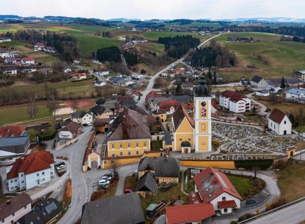 Drone shot, local view, parish church, Niederwaldkirchen, Mühlviertel, Upper Austria, Austria