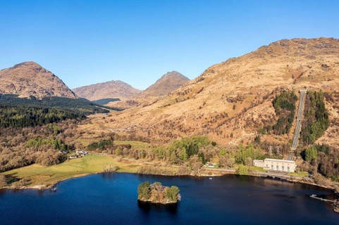 Aerial view, hydro-electric power station at Inveruglas, wooden pyramid viewing point on peninsula,