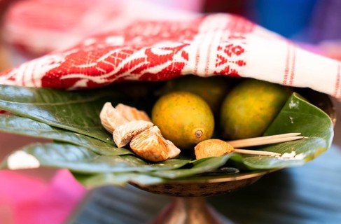 Assamese traditional food Tamul-paan (areca nut and betel leaves) at a stall during Magh Bihu or