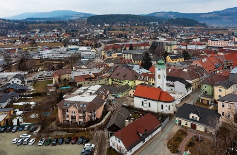 Drone shot, townscape with residential buildings and shopping centres, town view, Feldkirchen in