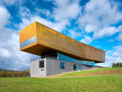 Nebra Ark on a green meadow with a cloudy sky, Museum of the Sky Disc, Visitor Centre, Nebra,