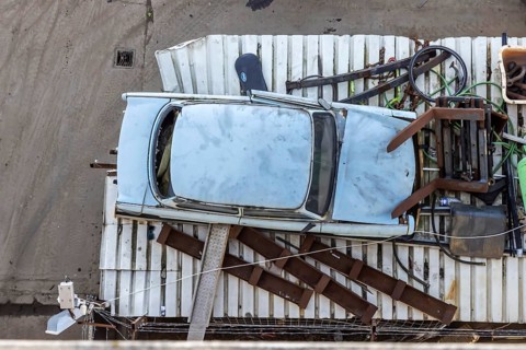 Metals are stored in a scrapyard in the harbour: scrap metal is a valuable raw material for