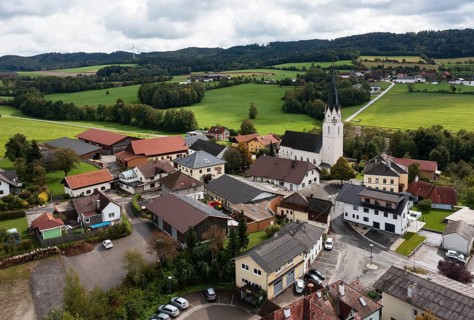 Drone shot, view of village with church, Sankt Marienkirchen am Hausruck, Hausruckviertel, Upper