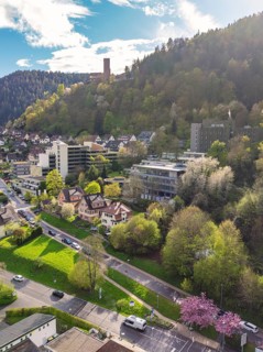 Townscape with surrounding forest and hills under a clear sky, Bad Liebenzell, district Calw, Black