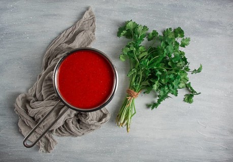 Tomato sauce with pepper and spices, Satsebeli, Georgian cuisine, red sauce, top view, homemade, no