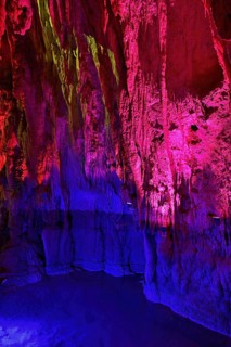Stalactites illuminated by coloured light, stalactite cave, Höllgrotten, Baar, Canton Zug,