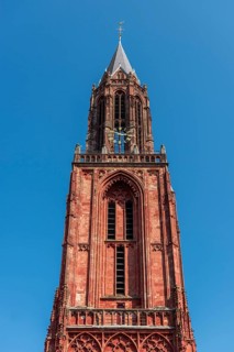 Maastricht, Netherlands, The Protestant Sint Janskerk rises against a clear blue sky
