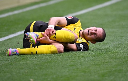Waldemar Anton Borussia Dortmund BVB (03) injured Injury on the ground PreZero Arena, Sinsheim,