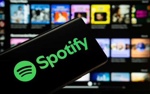 Dhaka, Bangladesh - 18 March 2025: The logo of the spotify is displayed on a smartphone screen, and