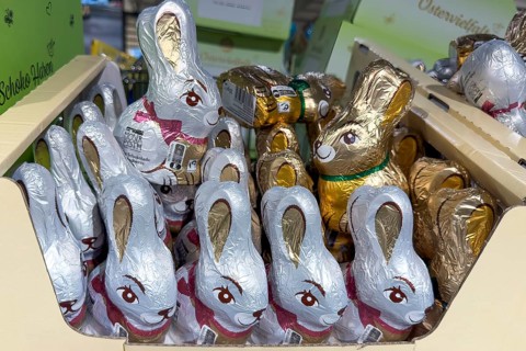 Display on retail shelf of wholesale chocolate Easter bunnies chocolate Easter bunnies wrapped in