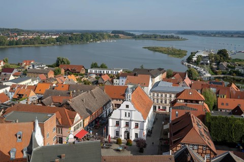 Old town with town hall, Peenestrom in the background, view from the tower of St Peter's Church,