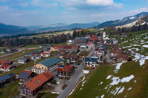 Drone image, residential buildings, settlement area, parish church, Riefensberg, Bregenzerwald,