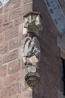 Angel figure, a house figure on the medieval residential tower, the Nassauer Haus, Lorenz Platz,