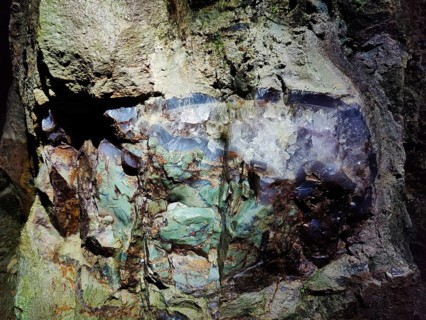 Green jasper with rock crystal in the visitor gallery of the Steinkaulenberg gemstone mines,