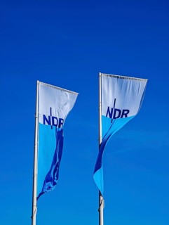 Two flags with lettering NDR, Norddeutscher Rundfunk, Landesfunkhaus Schlossplatz 3, flagpoles,