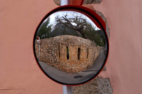 Reflection of a wall in a wide-angle mirror, traffic mirror 180 degrees, Alaró, Calvià, Majorca,