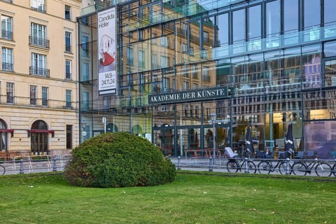 Academy of Arts with reflective façade and sign for the Candida Höfer exhibition on Pariser Platz