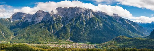 Panorama from Hoher Kranzberg, 1397m on Mittenwald, behind it the cloudy Karwendel Mountains,