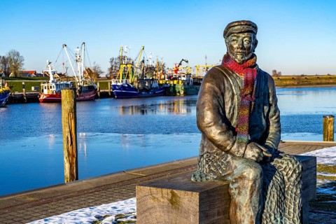 The fishing village of Greetsiel, historic fishing harbour, with the largest shrimp cutter fleet in