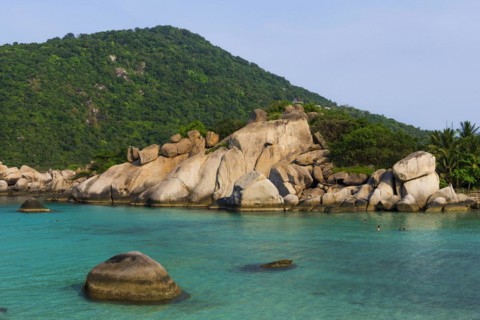 Bathing bay with turquoise water and granite rocks on the holiday island Nang Yuan Island, island,