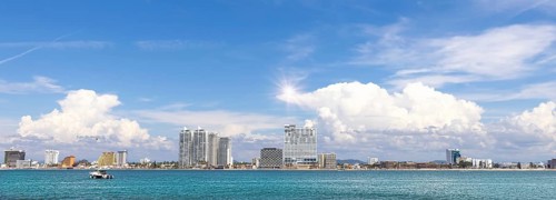 View from Deer Island, Isla de Venados, of famous Mazatlan sea promenade El Malecon, with ocean