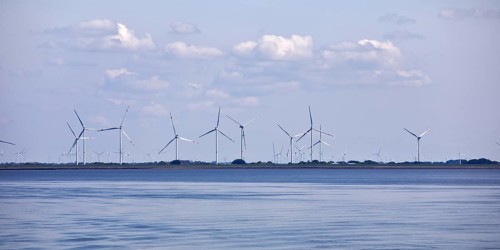 Schleswig-Holstein Wadden Sea National Park with a view of wind turbines on the mainland, North