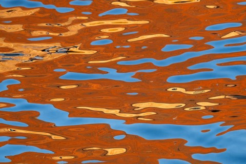 Colourful reflection on the water surface with abstract pattern, Frederiksholms Canal, Copenhagen,