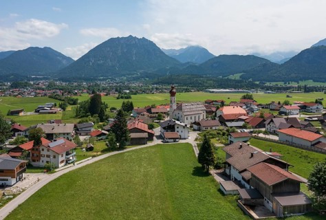 Drone image, view of the village with parish church, Wängle, Rettener Becken, Tyrol, Austria