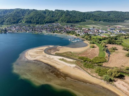 Aerial view of the mouth of the Stockacher Aach at low water, which flows into Lake Überlingen. The