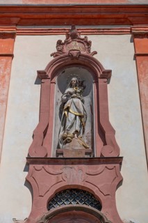 Sculpture of the Virgin Mary above the entrance portal of the baroque St Martin's Church, Riegel am