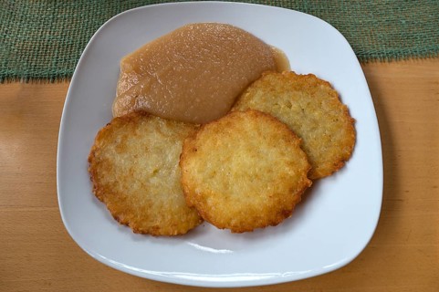 Franconian baggers, potato pancakes with apple sauce served in a pub, Franconia, Bavaria, Germany
