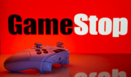 Dhaka, Bangladesh- 15 July 2025: Game controller in front of GameStop logo on a background