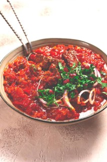 Chashushuli, a traditional Georgian dish, spicy, stewed meat with tomatoes and spices, homemade, no