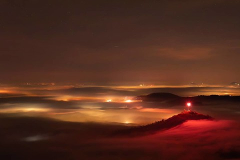 New Year's Eve fireworks 2024 on the Breitenstein, Swabian Alb near Ochsenwang. Sea of fog in the