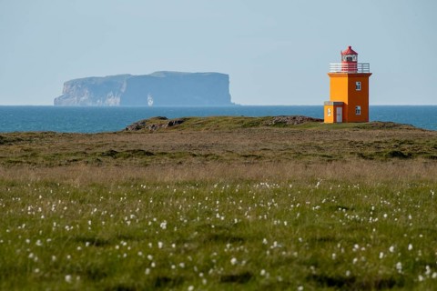 Lighthouse Hegranesviti, Hegranes, peninsula Landsendi, in the background island Drangey, near