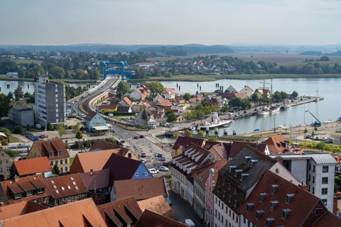 Town view with castle island, Peene river and Peene bridge, view from the tower of St Peter's