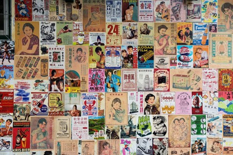 House wall with old posters and advertising, Chinatown, Bangkok, Thailand