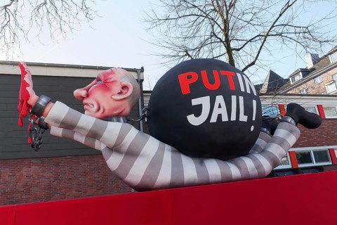 Russian President Vladimir Putin as a convict with blood on his hands, Put In Jail, papier-mâché