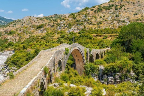 Aerial view of the Old Mes bridge near Shkoder. Albania, Europe. Ottoman stone arch bridge Ura e