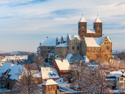 View of the snow-covered Schlossberg with St Servatius collegiate church and castle and the