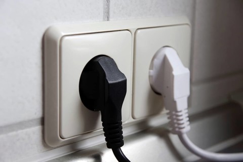 Double socket outlet, mains plug, black, white, electricity, household, Two different coloured