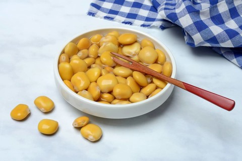 Lupine (Lupinus), pickled lupine seed in small bowls