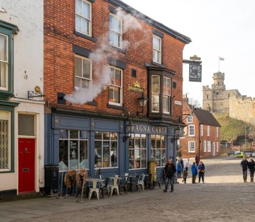 Magna Carta pub on Castle Hill, city of Lincoln, Lincolnshire, England, UK view to Observatory