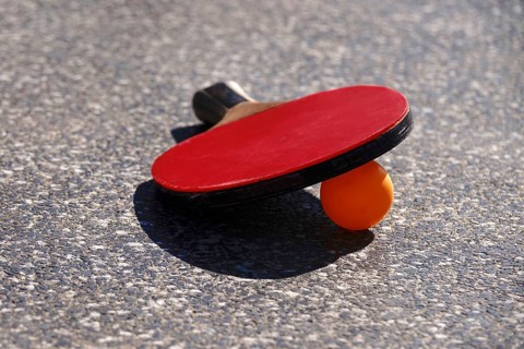 Outdoor table tennis table with ball and bat, Germany