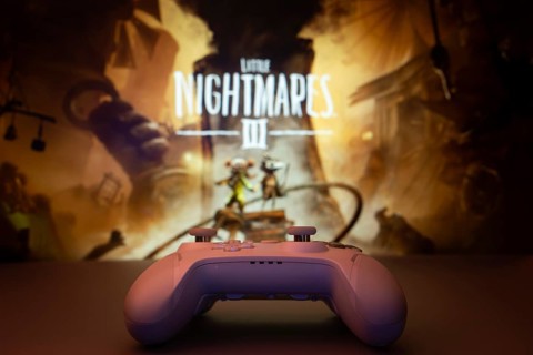 Dhaka, Bangladesh- 22 July 2025: A close-up of a gamepad with the little nightmares 3 seen on