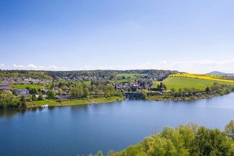 Malter, town view with dam and Weißeritz valley railway, in the background the Luchberg, aerial