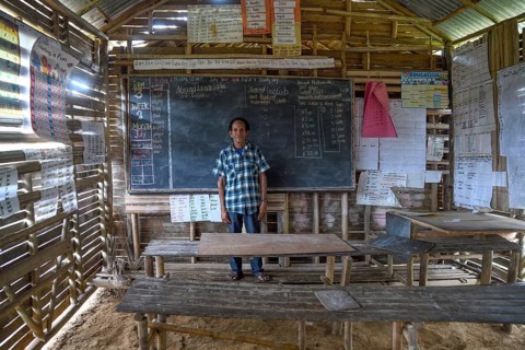 Local teacher in a school in the village of Upovia, Lake Murray, Western Province, Papua New Guinea